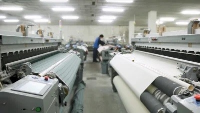 Ηλεκτρονική βαμβακιού υφάσματος αέρα αεριωθούμενη τεχνολογία 1000 περιστροφή/λεπτό ύφανσης αργαλειών μηχανική